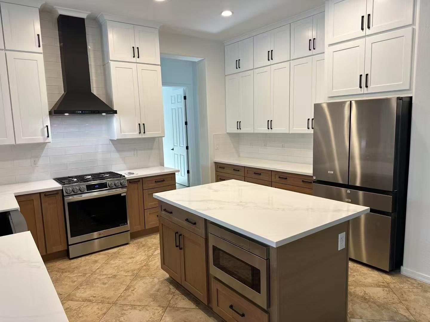 Taj Mahal quartzite kitchen countertop with island and undermount sink